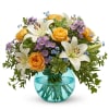 The gorgeous white Asiatic lilies grab your attention right away, but they