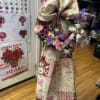 A lush cluster of pink, purple, white and red blooms creates a