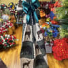 A tall, wrapped floral gift with a cozy, rustic vibe-perfect as a