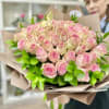 Artistically wrapped in our special Euro Floral paper accented with a decorated