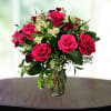 Pink rose bouquet in a clear glass vase
