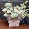 A luxurious blend of white blooms, soft green ranunculus , and gold-tinted
