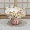 phalaenopses Orchid, premium Roses, Hydrangea, and Lisianthus in Ceramic vase.