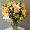 12 Yellow roses , lilys , daisies, carnations 
