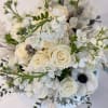White rose and anemone bouquet with airy white blossoms