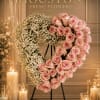 This sculpted heart arrangement is a tender, modern tribute that speaks in