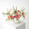 A refined, garden-inspired arrangement designed to bring softness and elegance into any