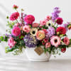A timeless expression of beauty and grace, Juliette is an elegant garden-style