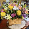 Bursting with sunny yellow roses and tall snapdragon spikes, this Spring Blossom