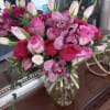 The 'Timeless Blossom' bouquet is a breathtaking floral arrangement that beautifully combines
