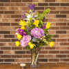 Vase of lavender, purple, green, and yellow - Lilies, hydrangeas, bells of