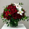 An ultra-luxury floral creation featuring an abundant number of premium red roses