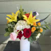 Our English Garden arrangement is a colorful mood booster to bring a