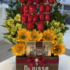 Red roses and sunflowers arranged with chocolates in a wooden gift box