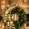 Beautiful Wreath for special occasion. White roses with different types of greenery.