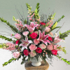Gorgeous bouquet of pink roses, lilies, and carnations