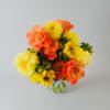 Sunburst warmth greets the eye in this compact hand-tied flower arrangement-bright orange