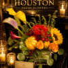 This vibrant holiday arrangement bursts with seasonal warmth and joyful color, beautifully