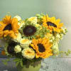 Golden sunflowers take center stage in this sunflower arrangement for birthdays, thank-yous