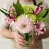 A soft, garden-style arrangement that reads like a sweet bouquet picked from