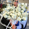 White Ocean Wave arrives as a stunning, rounded white bouquet in a