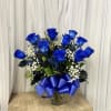 Vivid cobalt-blue roses take center stage in this bold flower arrangement, a