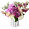 Big, fluffy pink and white hydrangea clusters steal the show in this