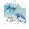 Decorative hanging plaque with two dolphins and the words 