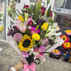 Comes with variety of mixed flowers roses , lilys , sunflower 