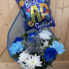 Our Best Dad in the Galaxy wrapped bouquet features vibrant blue roses