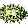 A serene, formal tribute crafted to honor a life: this sympathy flower