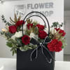A bold and luxurious arrangement designed to impress. Midnight Romance is styled