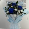 Elegant, calming, and unforgettable, the Blue Serenity Bouquet features a striking blend