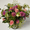 This lush composition is surrounded of  arabicum, dahlias, light pink roses