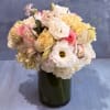 This arrangement feels soft, romantic, and effortlessly elegant. A lush gathering of