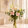 Beautfiul and elegant, this handcrafted bouquet features pink oriental lily stems with