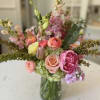 Mixed pastel bouquet in a clear glass vase