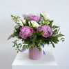 Pink and white peonies steal the show in this romantic peonies arrangement-perfect