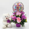 Bright, playful and impossible to miss, this birthday flower arrangement pairs a