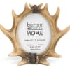 Antler-shaped photo frame holding a small picture