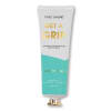Tube of hand cream with white and teal packaging