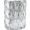 Clear faceted glass vase with geometric texture and heavy base giving a