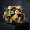 Moody Tweed brings together romance and artistry in a one-of-a-kind floral statement.