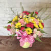 Rounded mix of pink carnations, yellow daisies,  &amp; alstroemeria in a