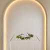 A delicate halo of wax flower with adjustable sizing. 
For more precise