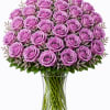 Lavender roses with mixed greens.

*Vase/container may vary depending on availability of stock