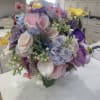A romantic, full-rounded bridal bouquet that reads like spring in pastels-soft blush