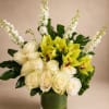A refined and luxurious arrangement featuring premium green cymbidium orchids, crisp white