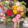 A bold, garden-style flower arrangement that feels like a backyard bloom-filled celebration
