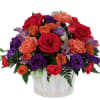 Give this exciting and colourful rounded basket of flowers for any occasion